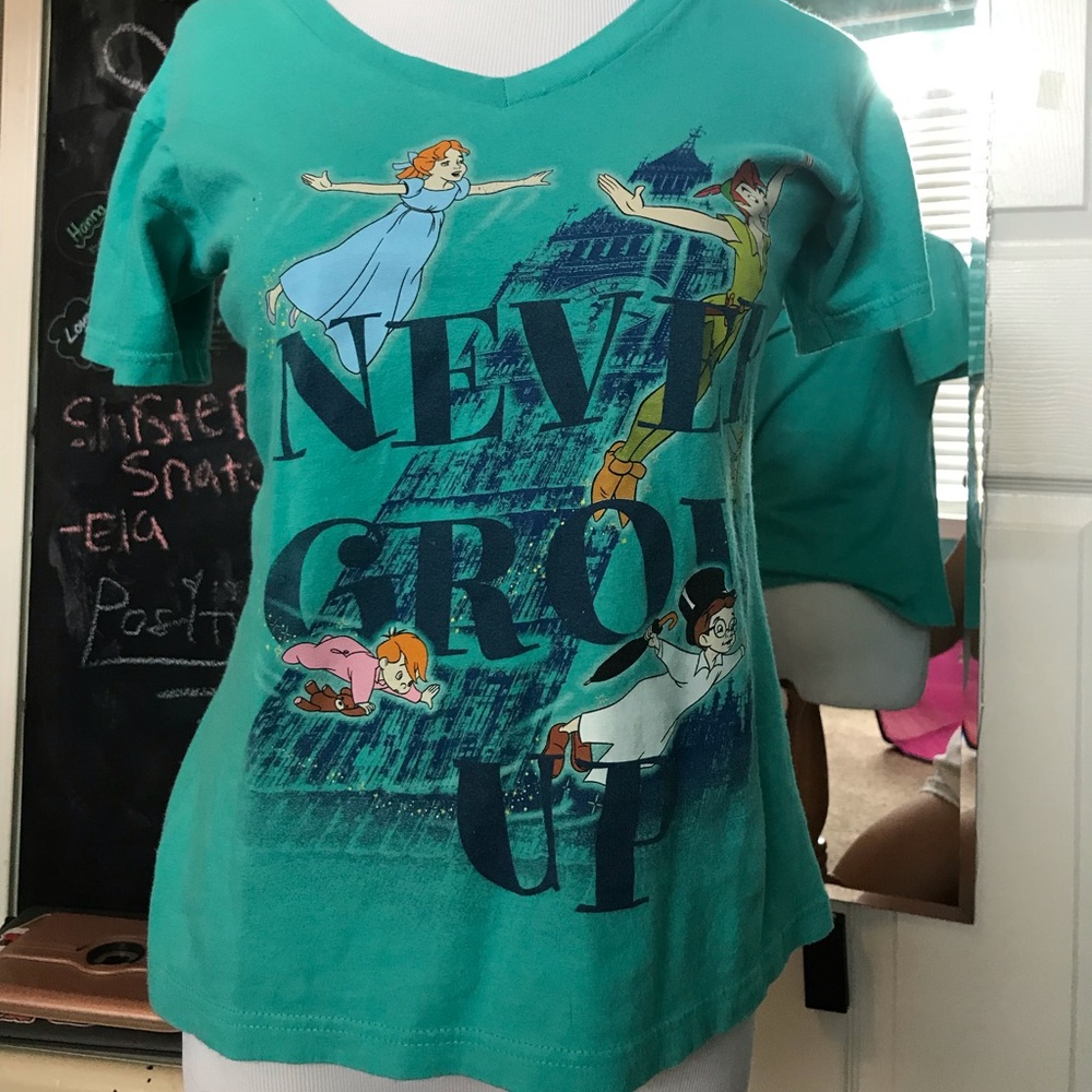 A green Peter Pan t shirt